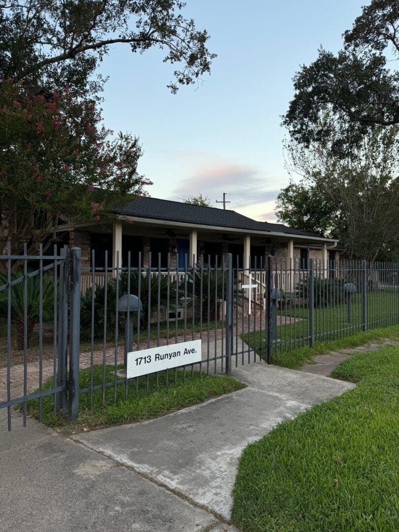 A fence with a sign on it that says " 2 7 1 5 palafox ave ".